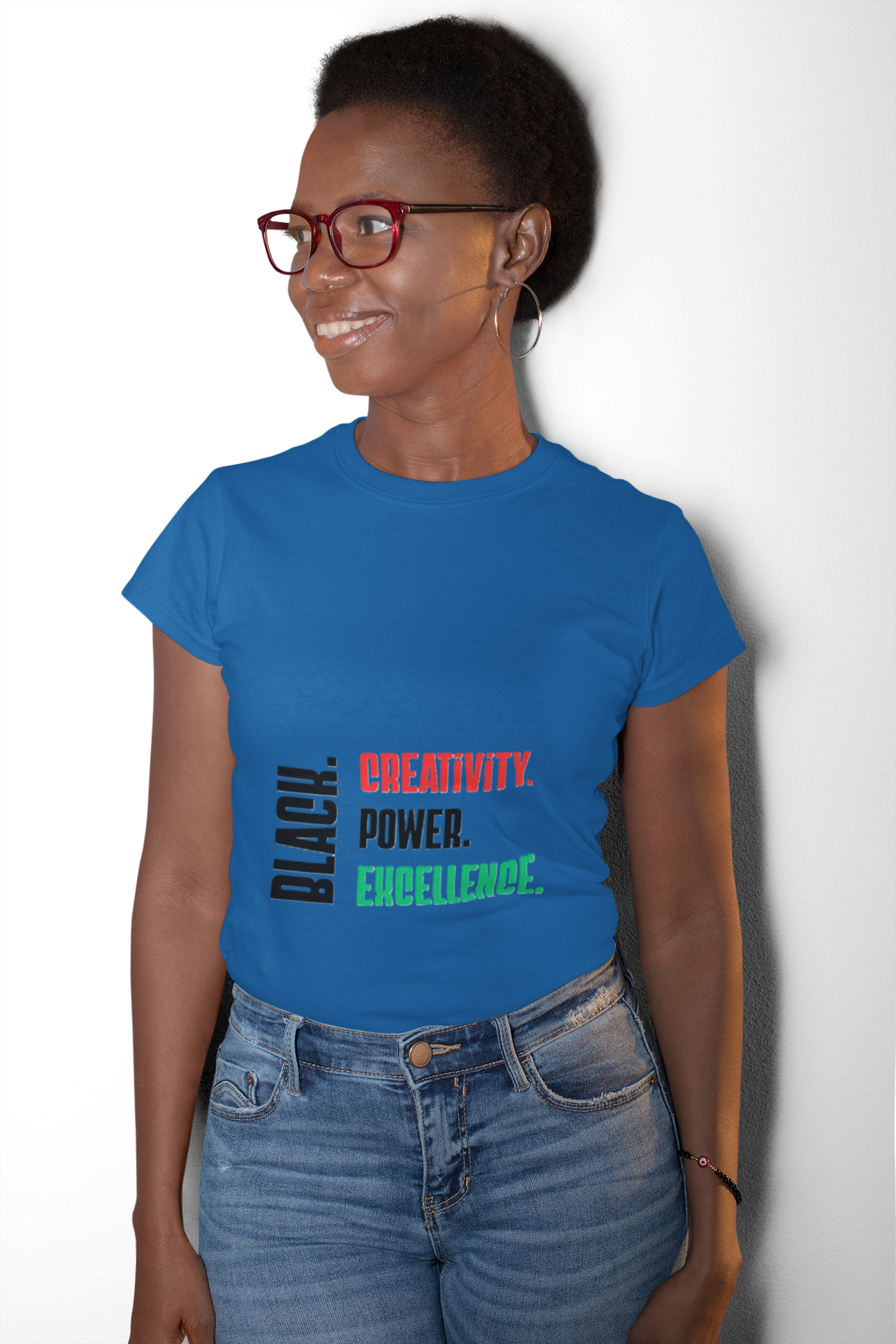 Ladies' text only Black. Creativity. Power. Excellence. Red, Black and Green Tee